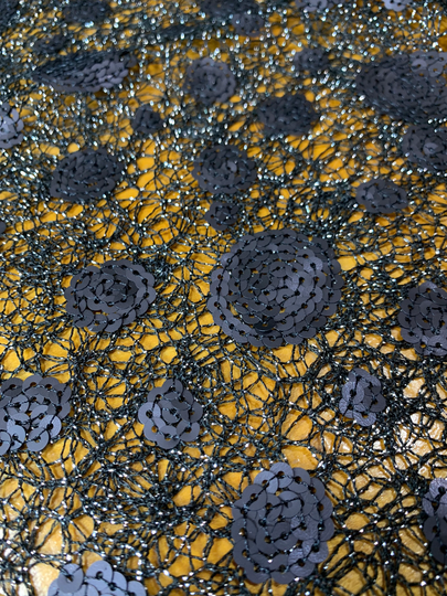 Dark Charcoal Sequin On A Black Metallic Lace Netting